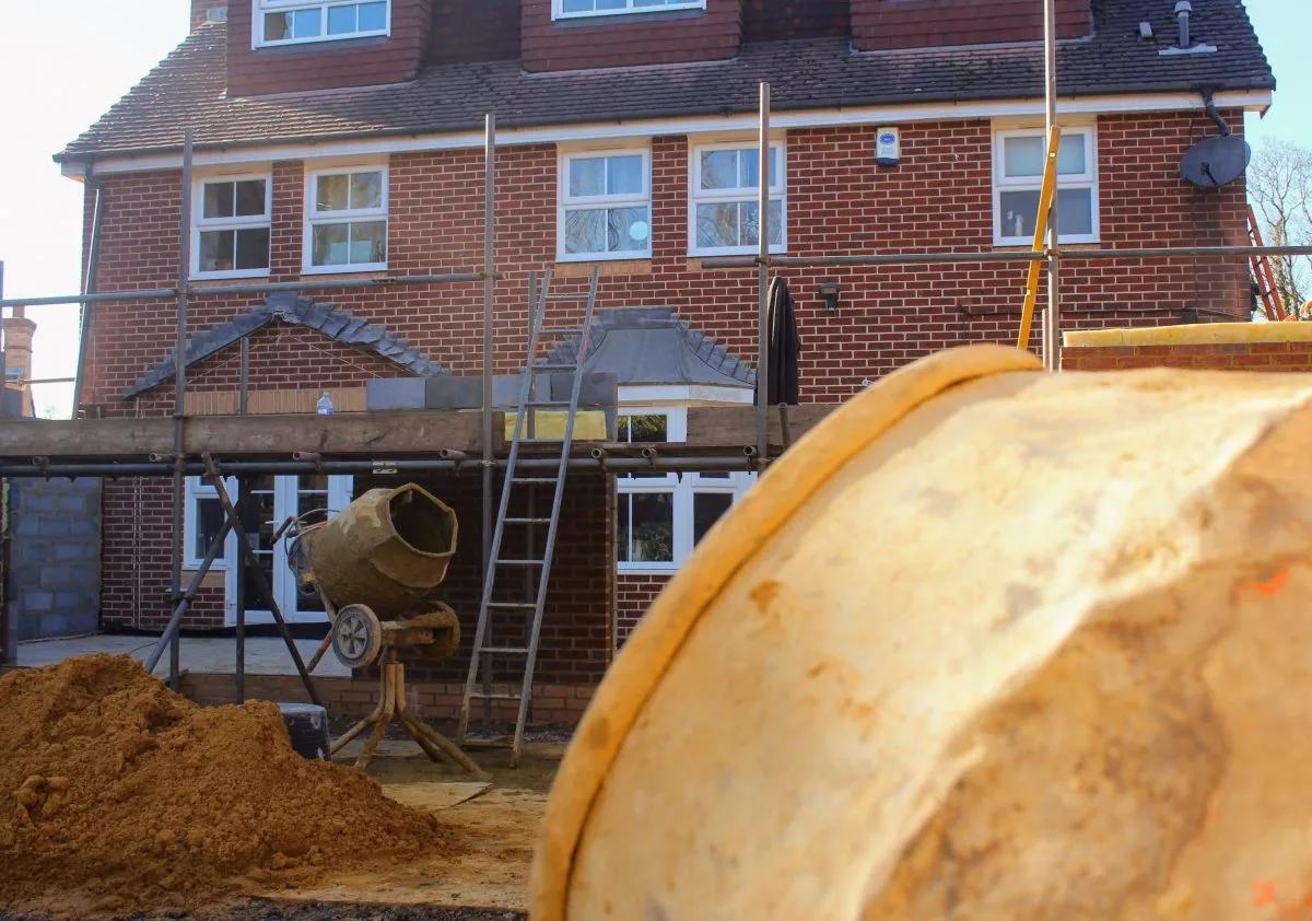 Rear extension during construction with scaffolding and blockwork